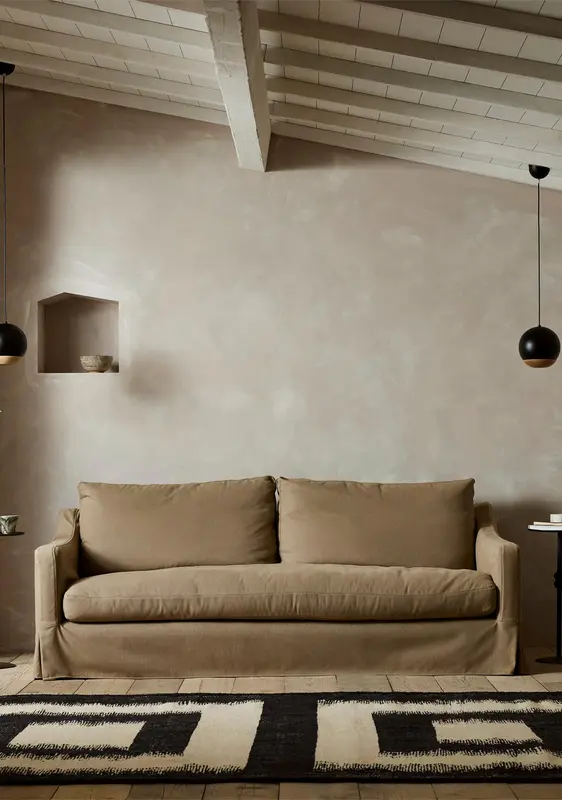 The Conrad skirted Bespoke Sofa by TallBoy Interiors