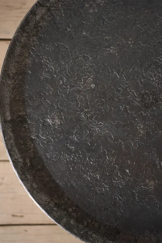 The Brokkr Forged Steel Martini Table - Heavy texture