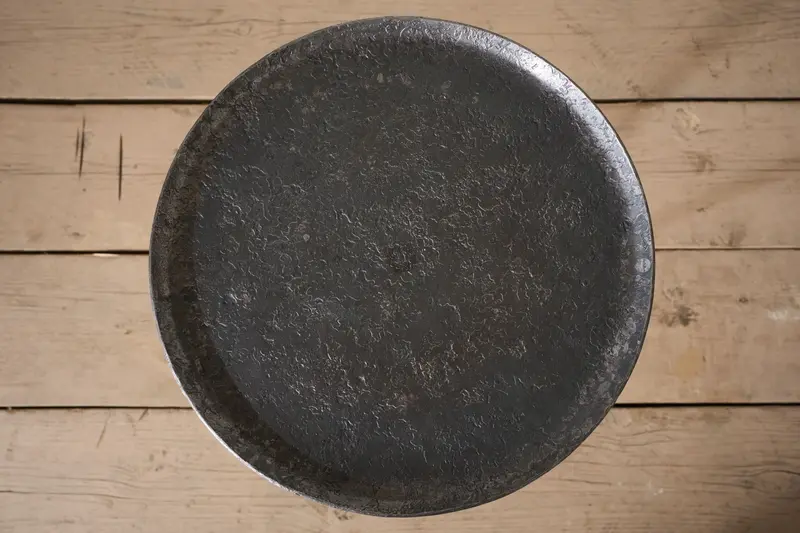 The Brokkr Forged Steel Martini Table - Heavy texture